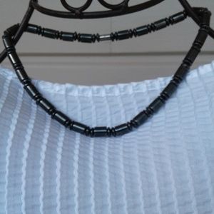 Unisex magnetic necklace with screw in clasp.
